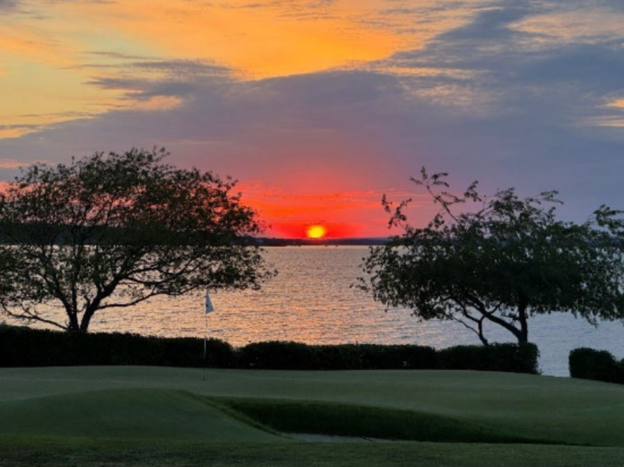 Golf course with sunset view